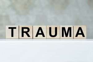 trauma wood blocks | neurofeedback therapy in greenwood village, co | trauma therapy for teens in englewood, co | trauma therapy in greenwood village, co | 80126 | 80129 | 80130 A close up of wooden blocks with letters that spell trauma. Learn how neurofeedback therapy in Greenwood Village, CO can offer support with trauma therapy in Greenwood Village, CO. Contact a therapist or search for "neurofeedback therapy denver" for support.